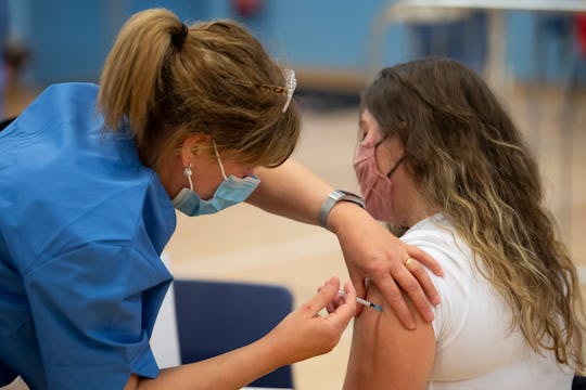 covid vaccine being administered