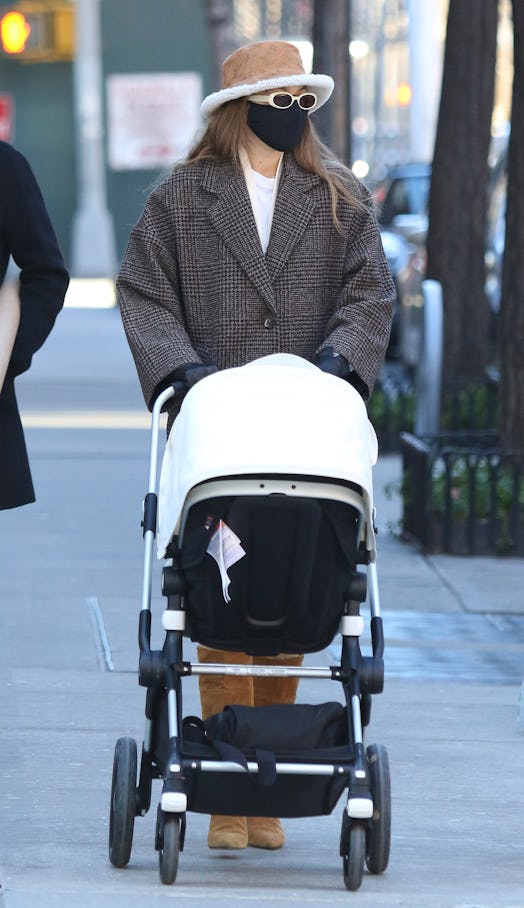Gigi Hadid goes for a walk with her baby and a friend on January 10th, 2021 in New York City.