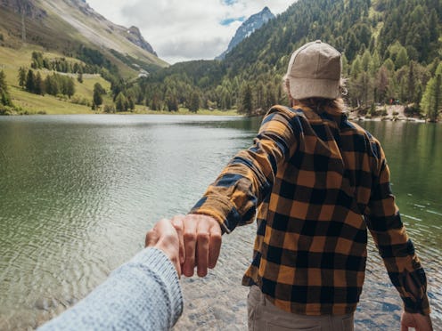A man and a woman on a hike.