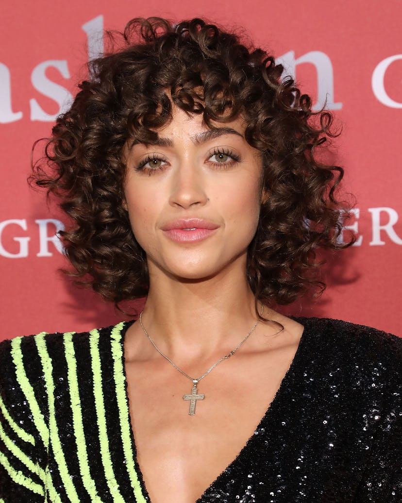 Model Alanna Arrington is a master of styling cute curly bangs 
