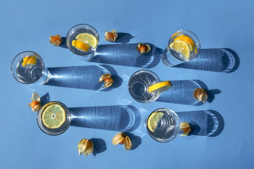 Glasses of seltzer with lemon on a blue background. Dry january delayed one woman's sobriety - here'...