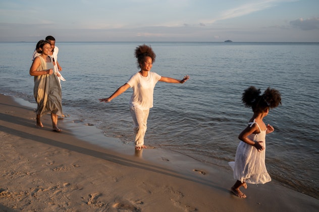 family walking on beach