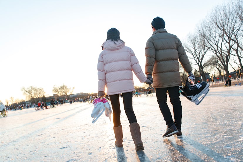 couple walking with ice skates in an article with romantic valentine's day poems