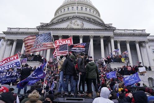 MAGA supporters attack the U.S. capitol building. Photo via Getty Images
