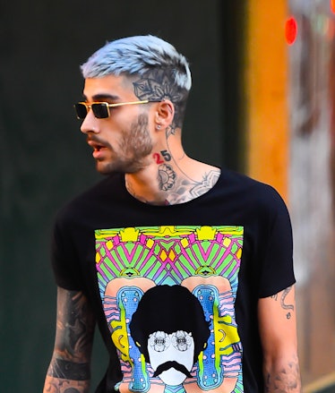 Zayn Malik hits the streets in a graphic tee.