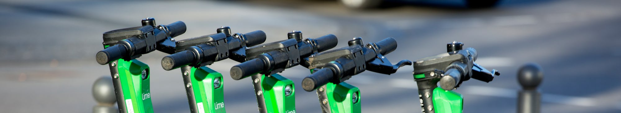 Wiesbaden, Germany - February 15, 2020: Electric push scooters of Lime in the city center of Wiesbad...