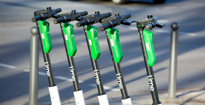 Wiesbaden, Germany - February 15, 2020: Electric push scooters of Lime in the city center of Wiesbad...