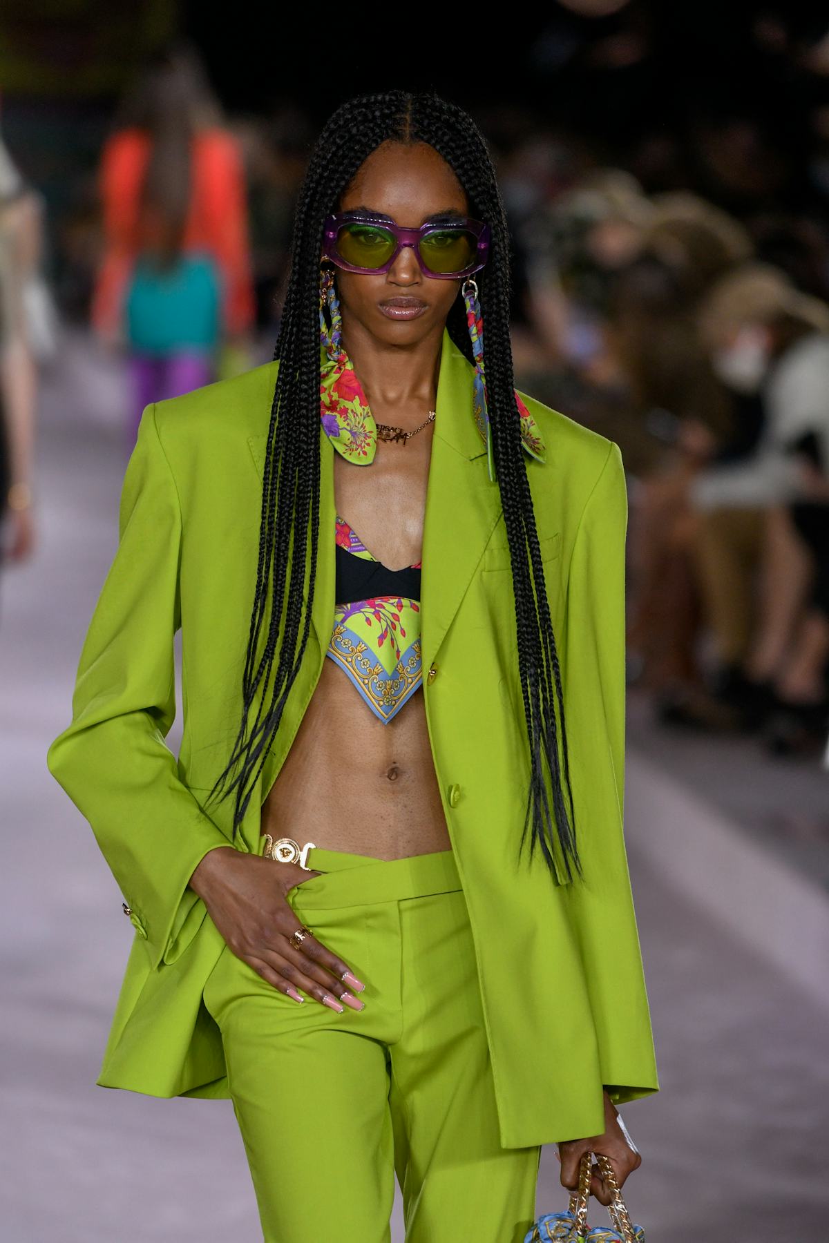 MILAN, ITALY - SEPTEMBER 24: A model walks the runway during the Versace fashion show on the third ...