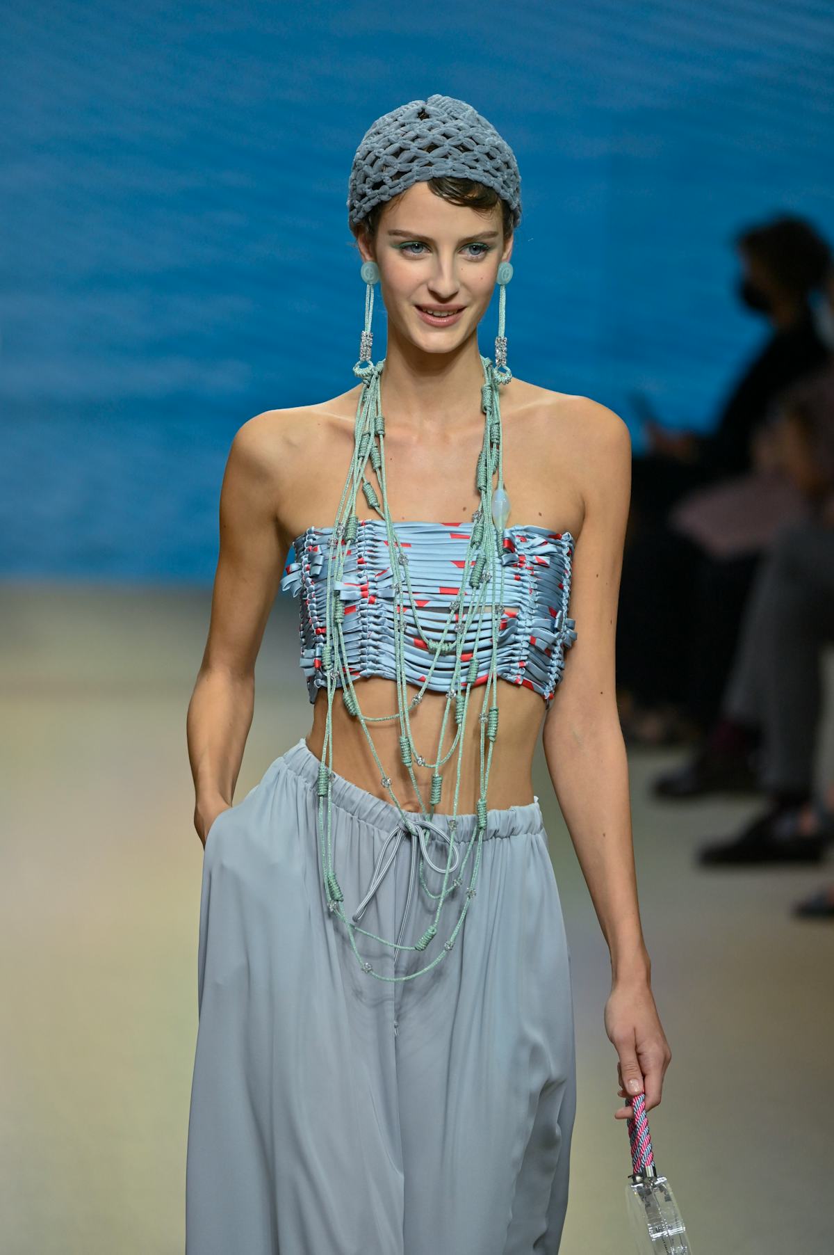 MILAN, ITALY - SEPTEMBER 25: A model walks the catwalk at the Armani fashion show on the fourth day ...