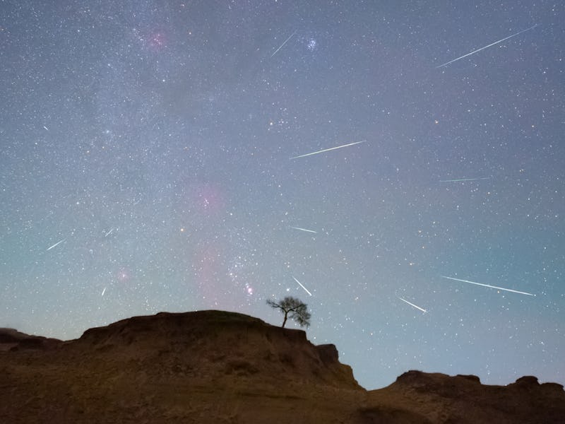 DAQING, CHINA - OCTOBER 22, 2020 - The Orionids meteor shower is seen over the Songhua River in Daqi...