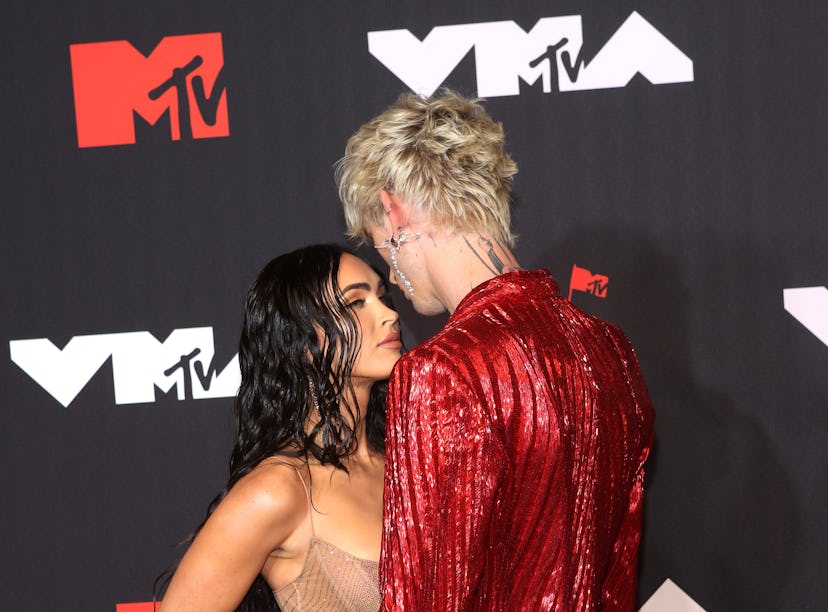 Megan Fox and Machine Gun Kelly on the red carpet. Their first kiss sounds weirdly hot.