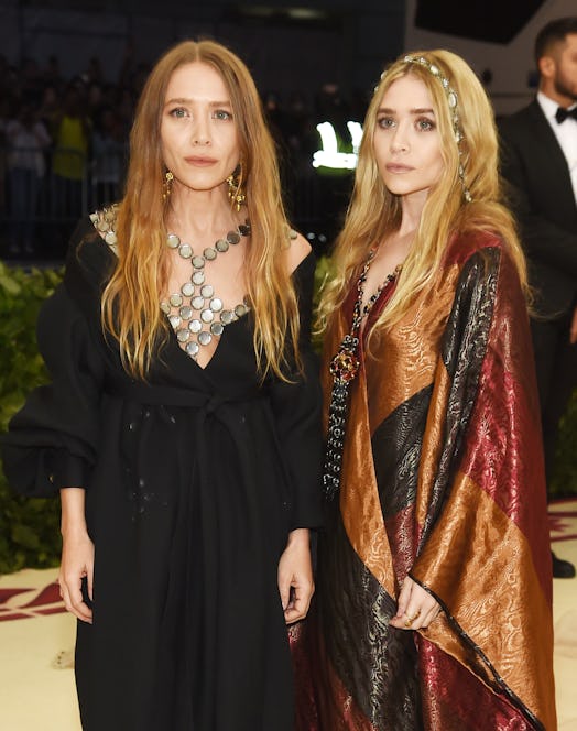 Mary-Kate Olsen and Ashley Olsen attend the Heavenly Bodies: Fashion & The Catholic Imagination Cost...