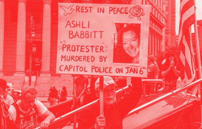 NEW YORK, NY - JULY 25: A right wing protester holds a sign about Ashli Babbitt while participating ...