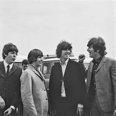 British rock group the Beatles at London Airport (later Heathrow), UK, 13th August 1965. They are on...