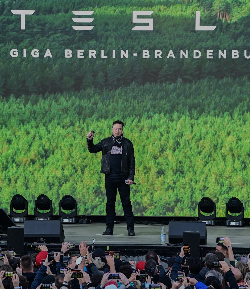 09 October 2021, Brandenburg, Grünheide: Elon Musk, Tesla CEO, stands on a stage at the Tesla Gigafa...