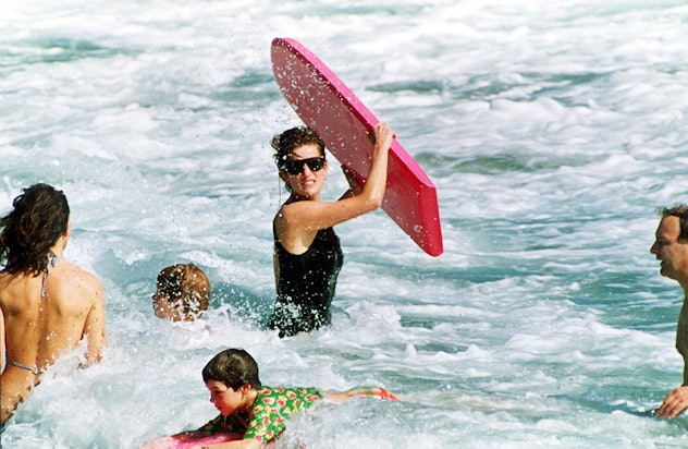 Princess Diana swims with her kids.