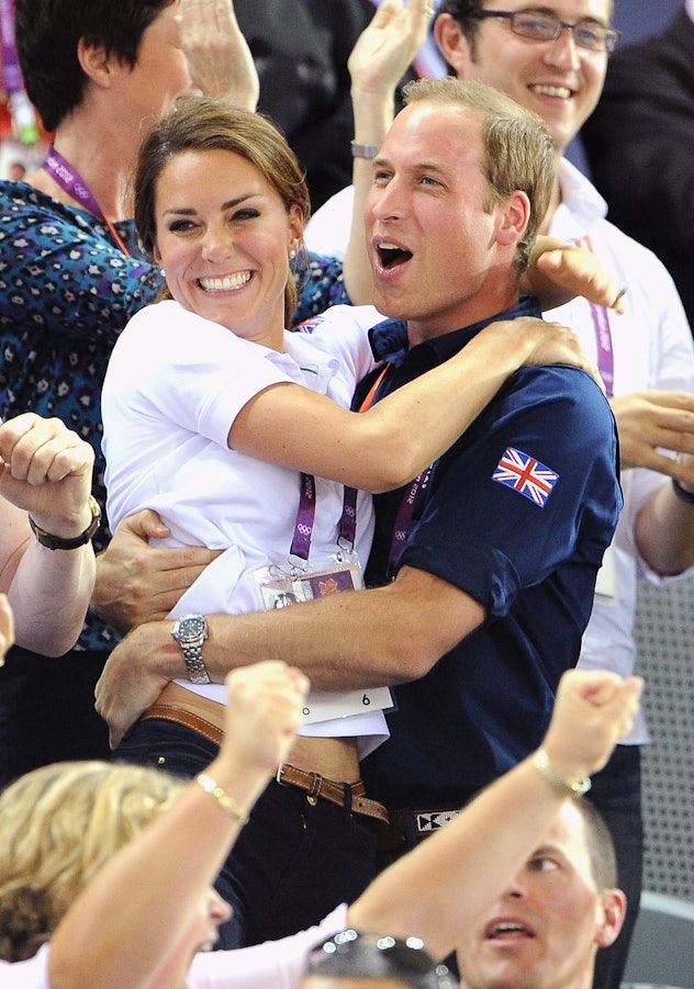 Prince William hugs Kate Middleton.
