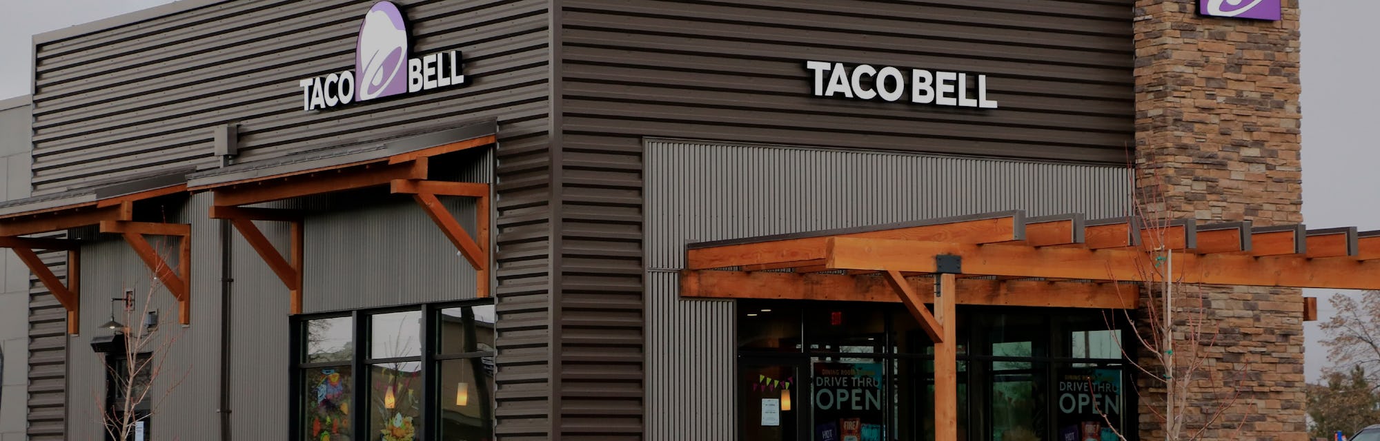 Taco Bell fast food restaurant showing logo on outside walls, northern Idaho. (Photo by: Don & Melin...