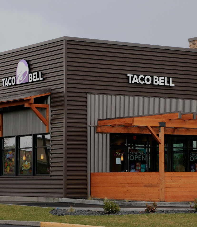 Taco Bell fast food restaurant showing logo on outside walls, northern Idaho. (Photo by: Don & Melin...