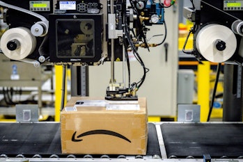 EASTVALE, CA - AUGUST 31: A package on the conveyor belt gets its label at Amazon fulfillment center...