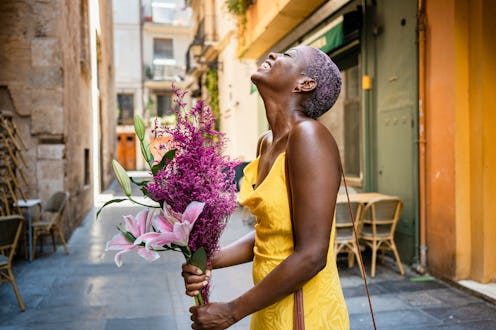 woman happy with a bouquet of flowers