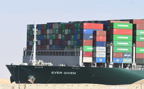 The Panama-flagged MV 'Ever Given' container ship is tugged in Egypt's Suez Canal after it was fully...