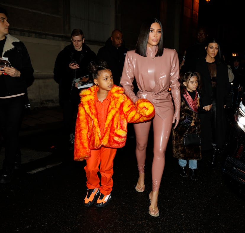 Kourtney Kardashian, daughter Penelope Disick, Kim Kardashian and daughter North West arrive at the ...