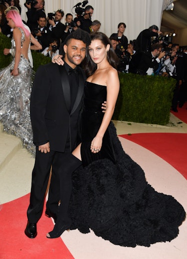 The Weeknd (L) and Bella Hadid attend the 'Manus x Machina: Fashion in an Age of Technology' Costume...