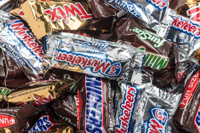 "Miami, Florida, USA - May 20, 2012: Assorted mini size chocolate candy bars background, twix, 3 mus...
