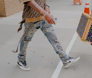 NEW YORK, NY - JULY 08:  Travis Scott is seen in walking out of a hotel in SoHo on July 8, 2021 in N...