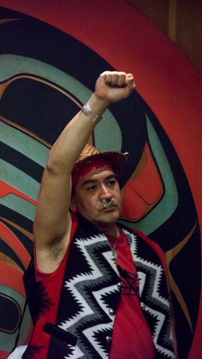 SEATTLE, WA - OCTOBER 13: Men celebrate during Indigenous Peoples' Day events at the Daybreak Star C...