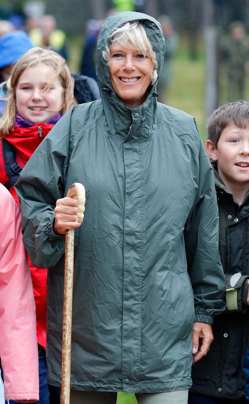 Camilla Parker-Bowles hiking in the rain.