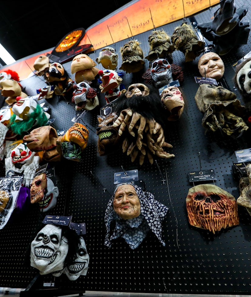 VIRGINIA, USA - OCTOBER 12: Halloween-themed masks are placed on sale at a shop as consumers have st...