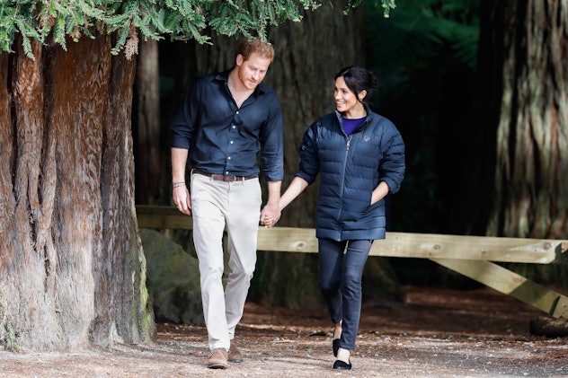 Prince Harry and Meghan Markle in the forest.