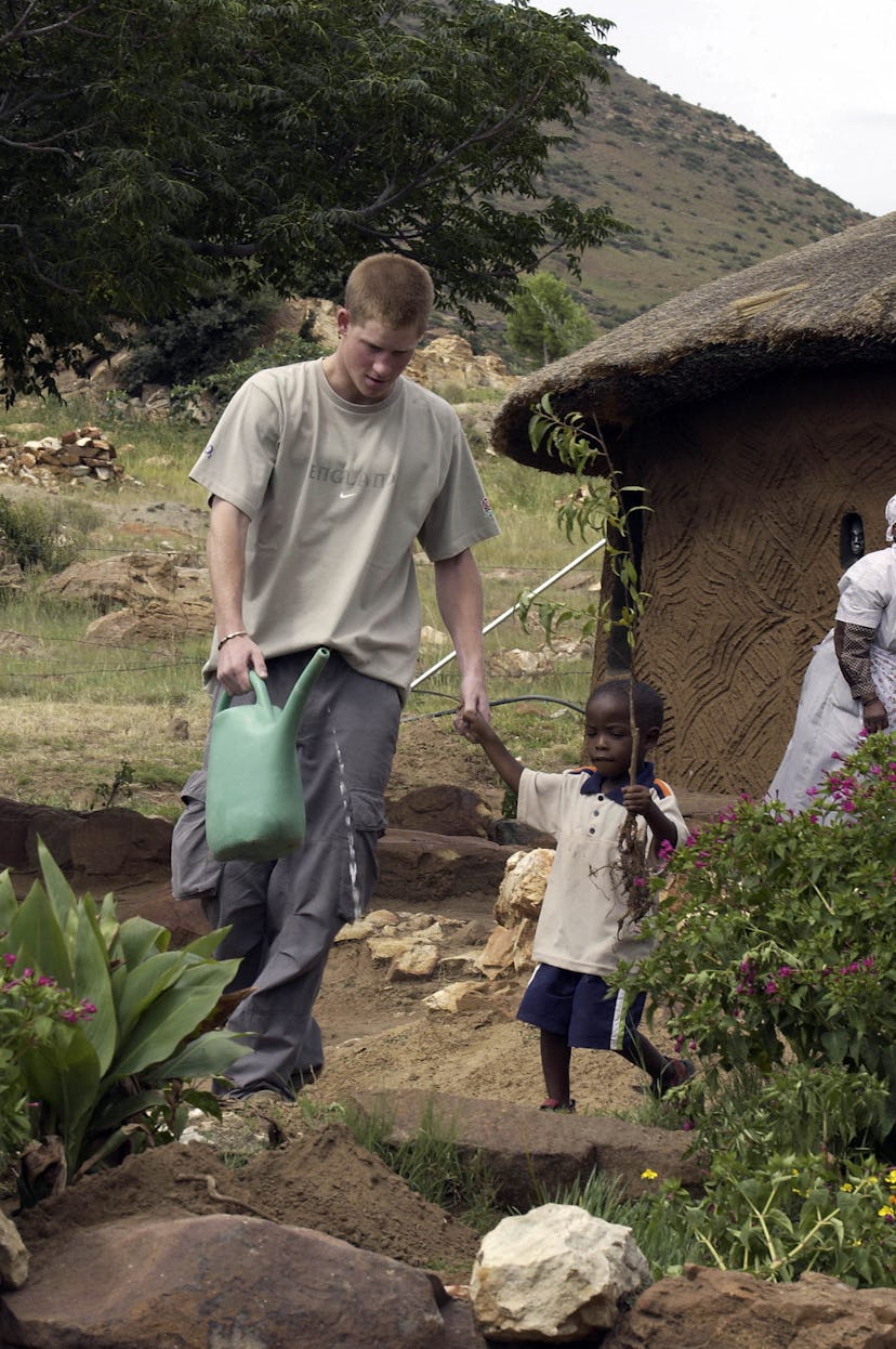 Prince Harry gets work done outdoors.