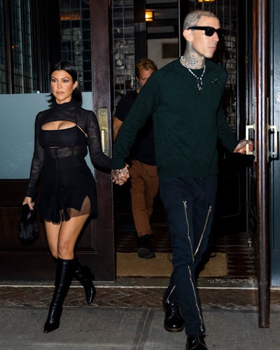 Kourtney Kardashian wears CUP OF STARS Tate Blouse while out to dinner Travis Barker at Zero Bond in...