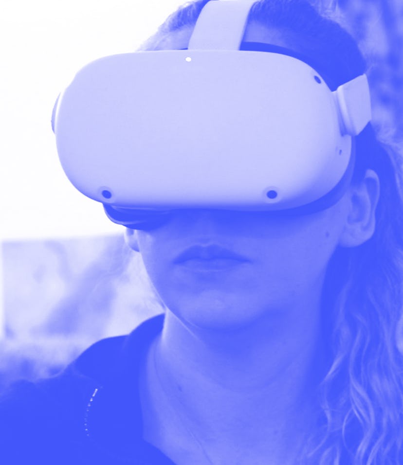 Amy Erdt, a community leader in the virtual reality space, sits in her living room and travels to fo...