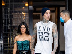 Kourtney Kardashian and Travis Barker's proposal body language is seriously sexy.