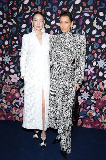 Gigi Hadid and Bella Hadid attend the Harper's Bazaar Exhibition 