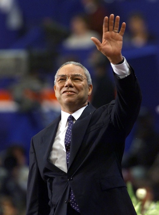 Former General Colin Powell waves to the crowd during his speech to the evening session of the 2000 ...