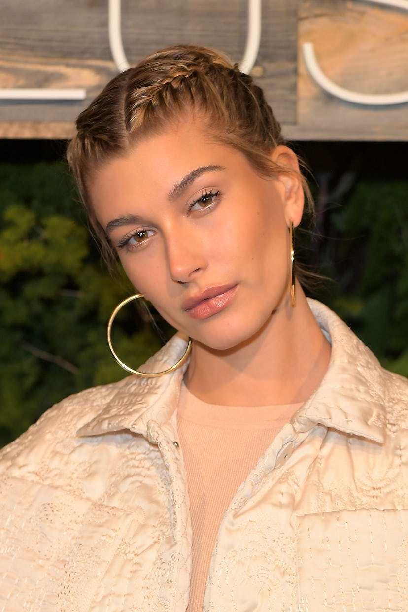 Hailey Baldwin wears French braids at the H&M Conscious Exclusive Dinner at Smogshoppe.