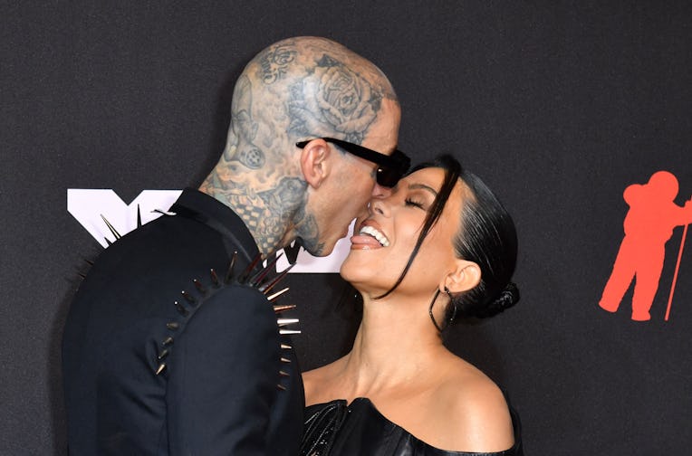 US drummer Travis Barker and US personality Kourtney Kardashian arrive for the 2021 MTV Video Music ...