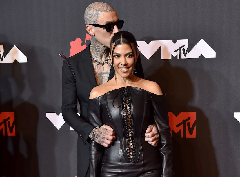 Travis Barker and Kourtney Kardashian at the VMAs. Months later, the two got engaged, and Kourtney K...