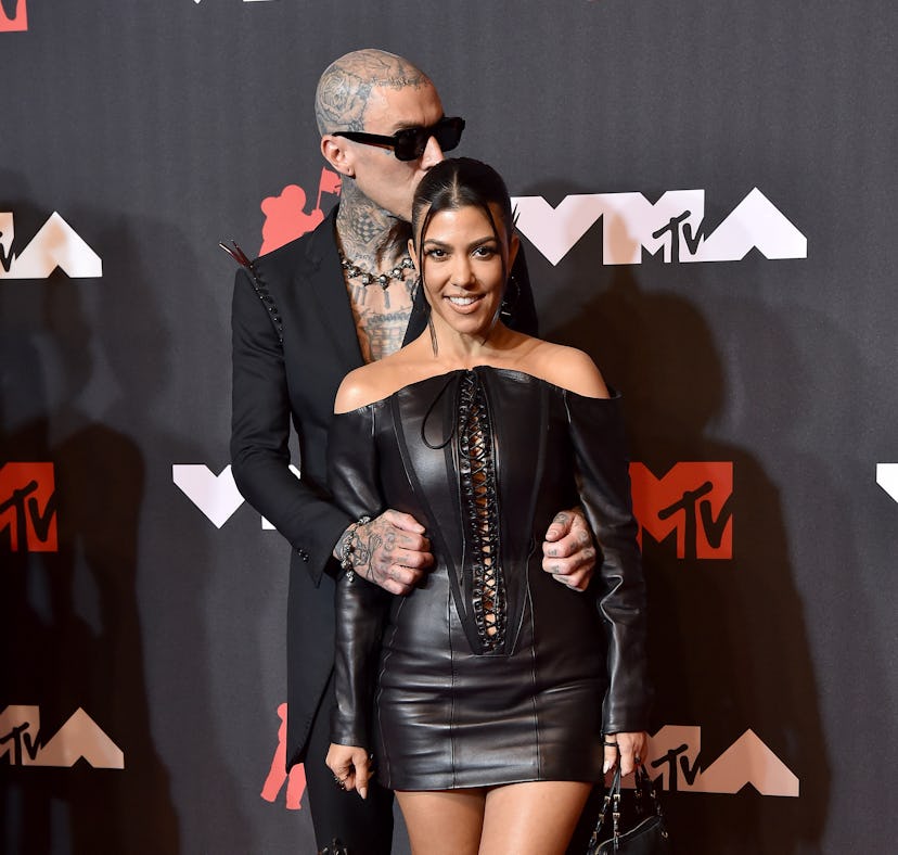 Travis Barker and Kourtney Kardashian at the VMAs. Months later, the two got engaged, and Kourtney K...