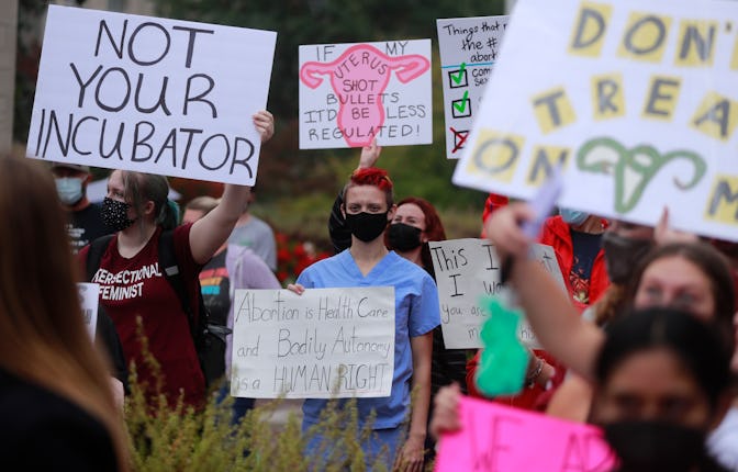 BLOOMINGTON, INDIANA, UNITED STATES - 2021/10/02: Demonstrators gather with placards expressing thei...