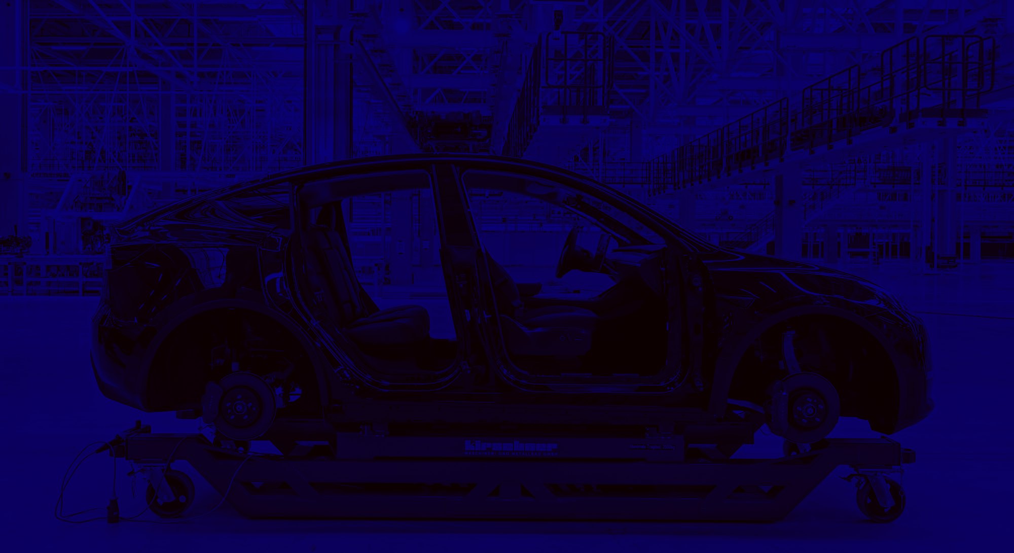 09 October 2021, Brandenburg, Grünheide: A Tesla Model Y is seen in a production hall of the Tesla G...