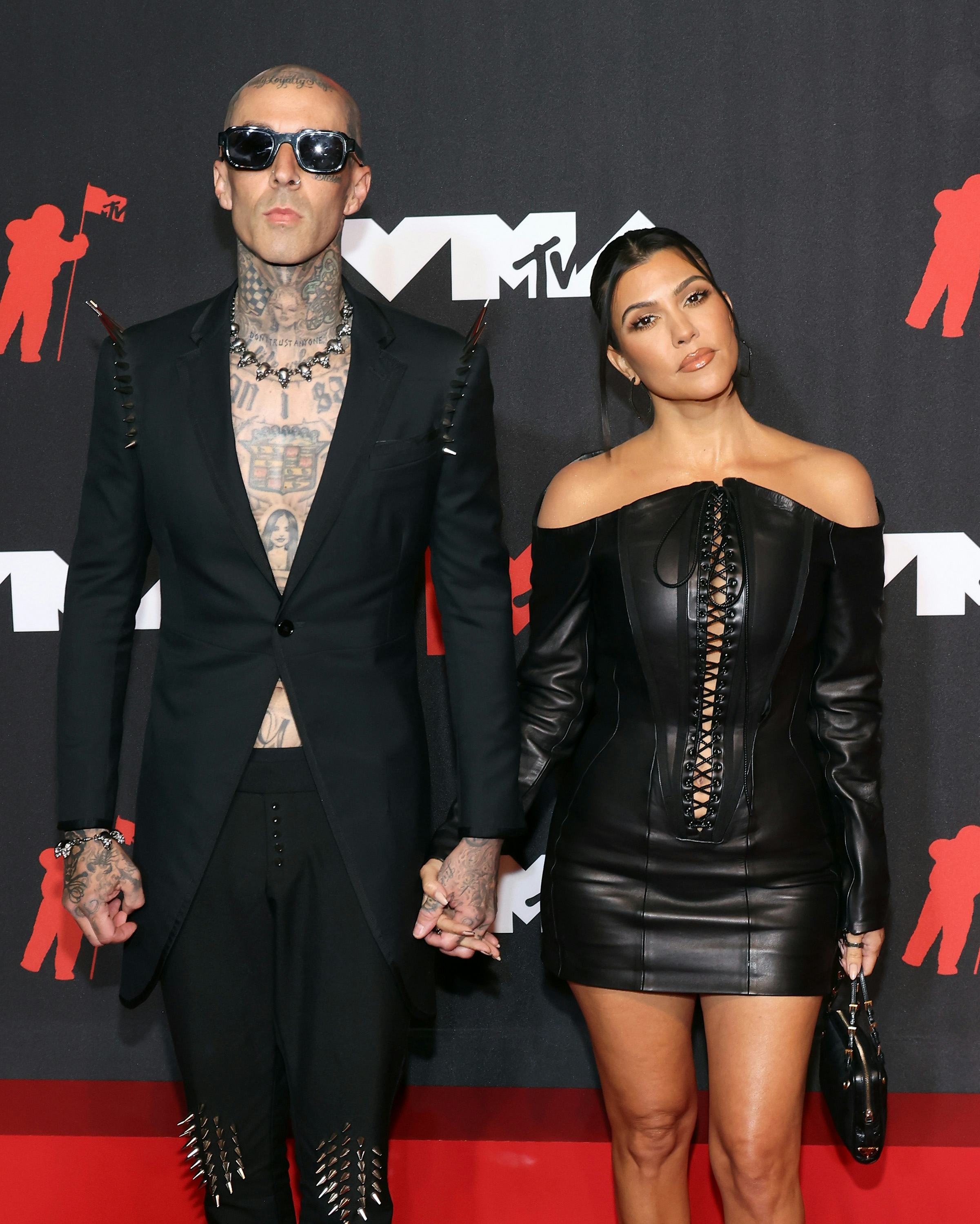 Kourtney Kardashian & Travis Barker's Relationship Timeline Is So Romantic