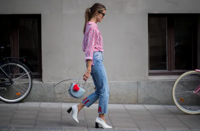 Do Jeans Shrink In The Dryer? How To Dry Jeans, According To Experts