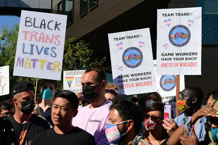 People rally in support of the Netflix transgender walkout in Los Angeles, California on October 20,...