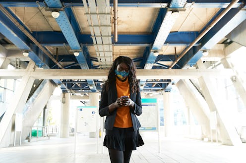 Woman wearing a face mask in the UK